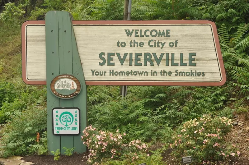 Downtown Sevierville Tennessee streets and Smoky Mountains backdrop